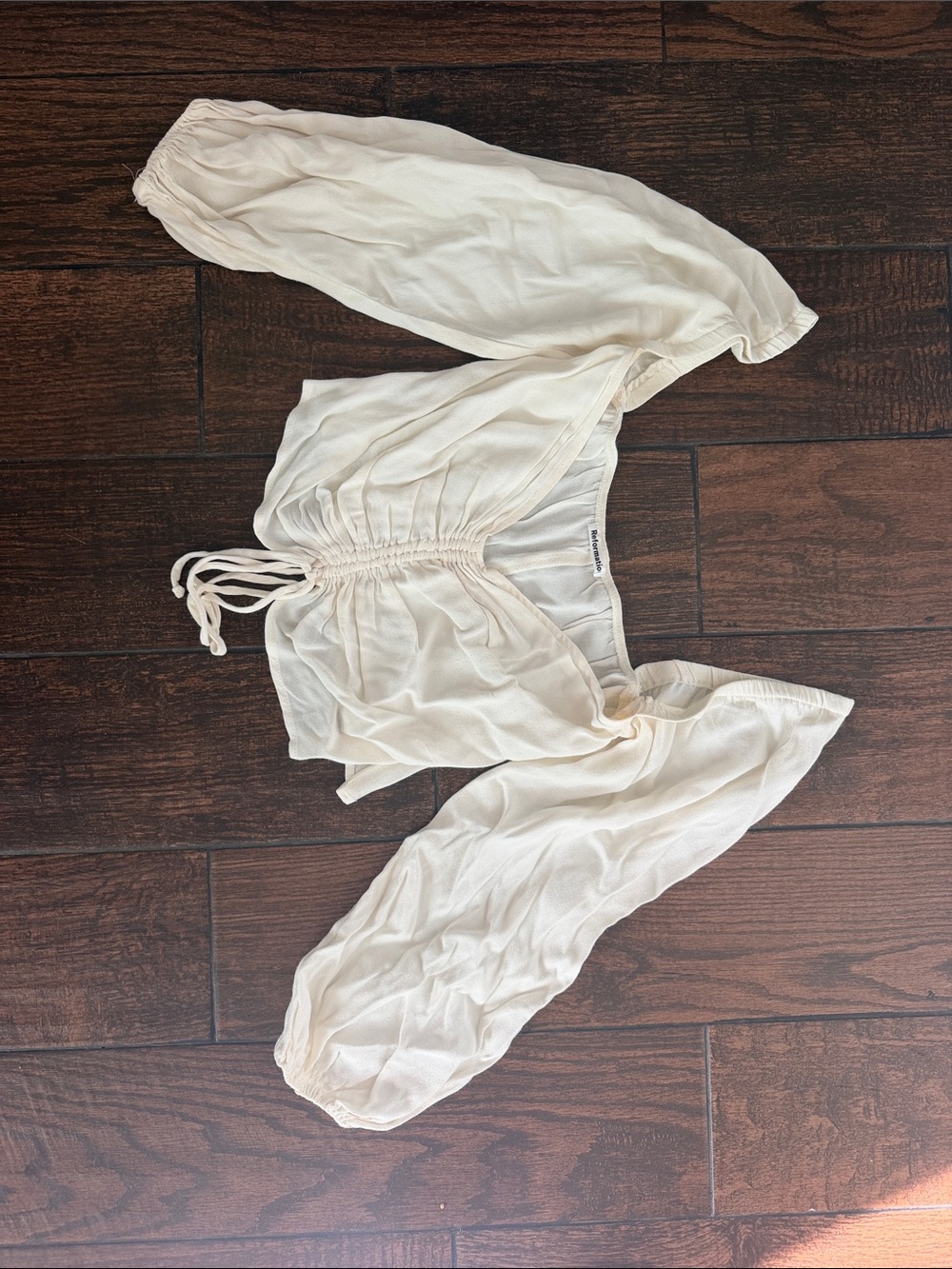 Reformation Cream Off-Shoulder Drawstring Crop Top
